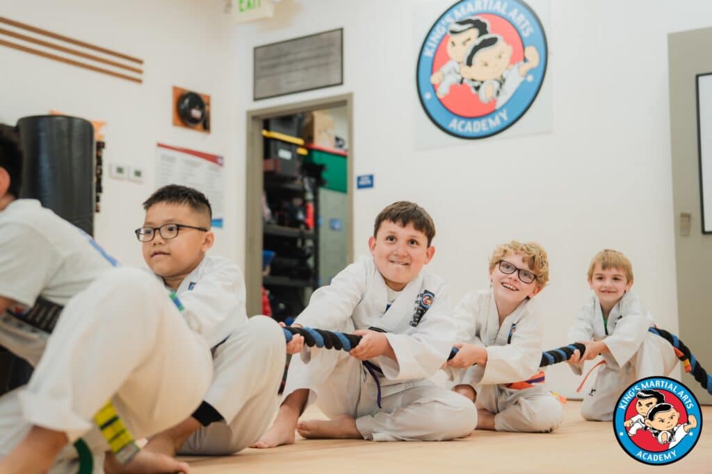 King's Martial Arts Academy students playing tug of war.