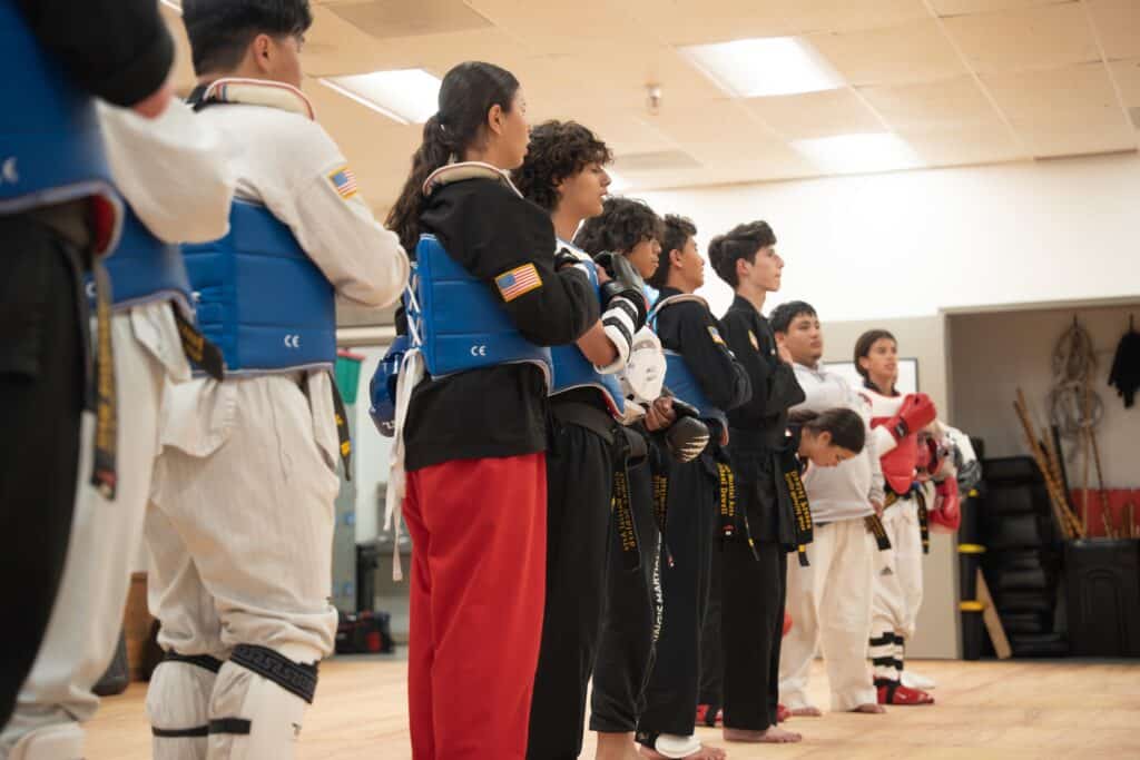 King's Martial Arts Black Belt students wearing sparring gear.